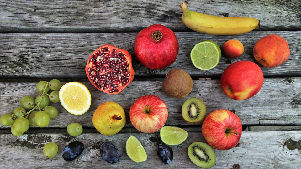 Colourful fruit on a wooden table