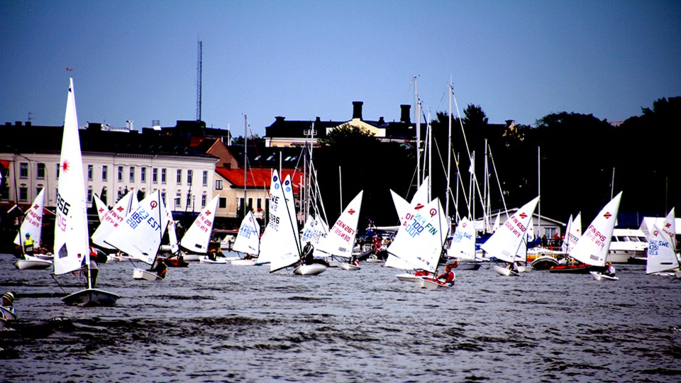 people competing in sailboat competition